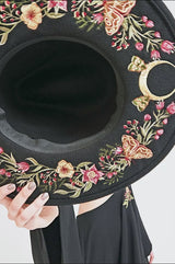 video of goth girl wearing restyle hat