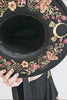 video of goth girl wearing restyle hat