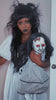 emo woman wearing a gothic outfit 