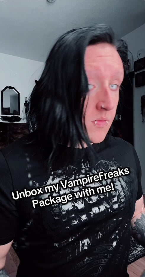 gothic man wearing goth clothes in a short video
