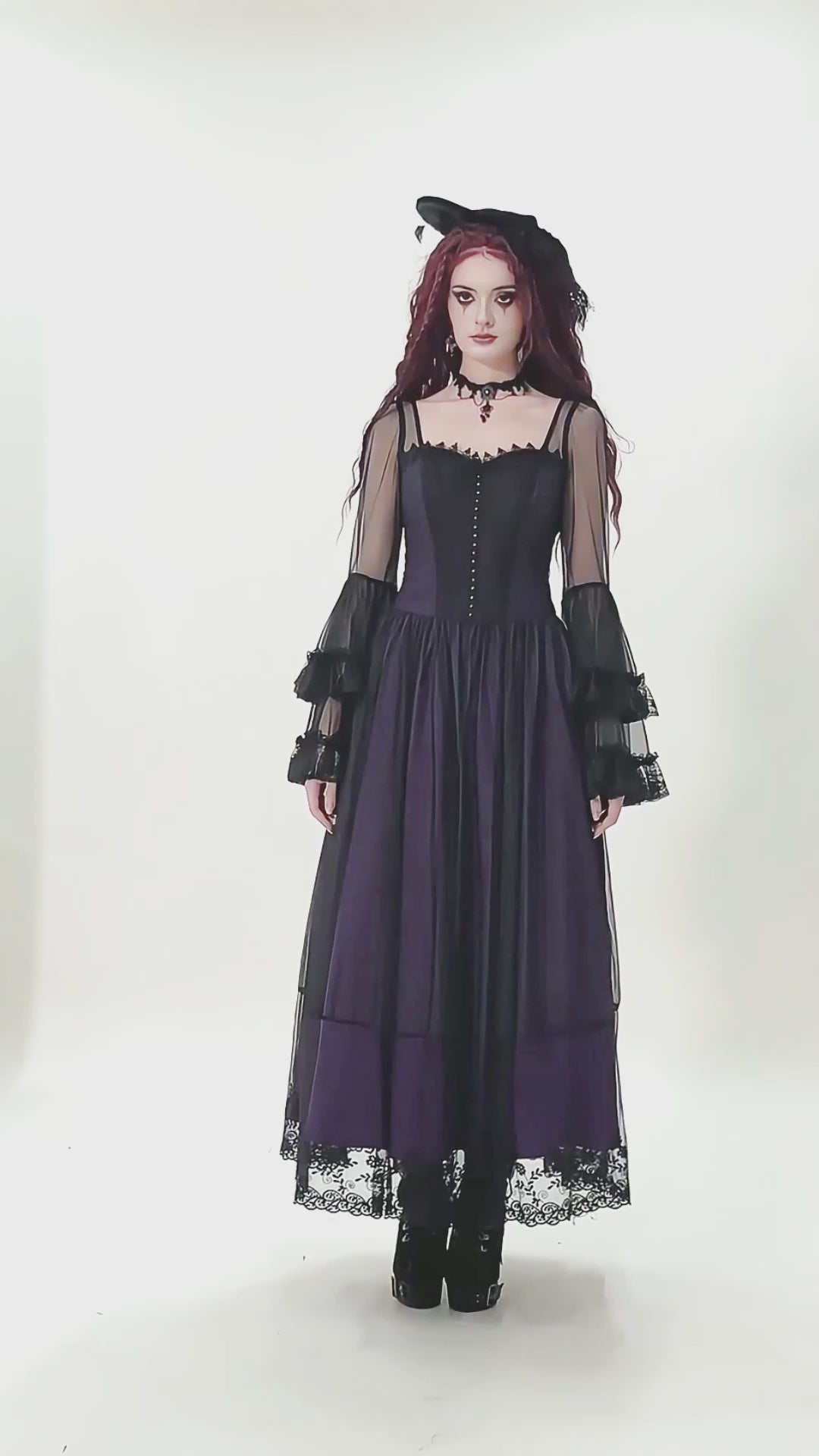 video of gothic woman wearing a lace-up long lace dress