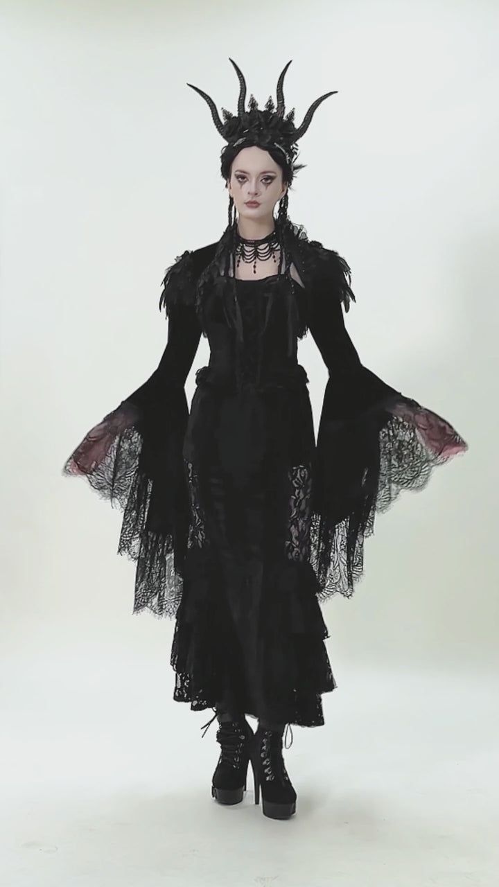 video of a goth woman wearing a long sleeve gothic bolero