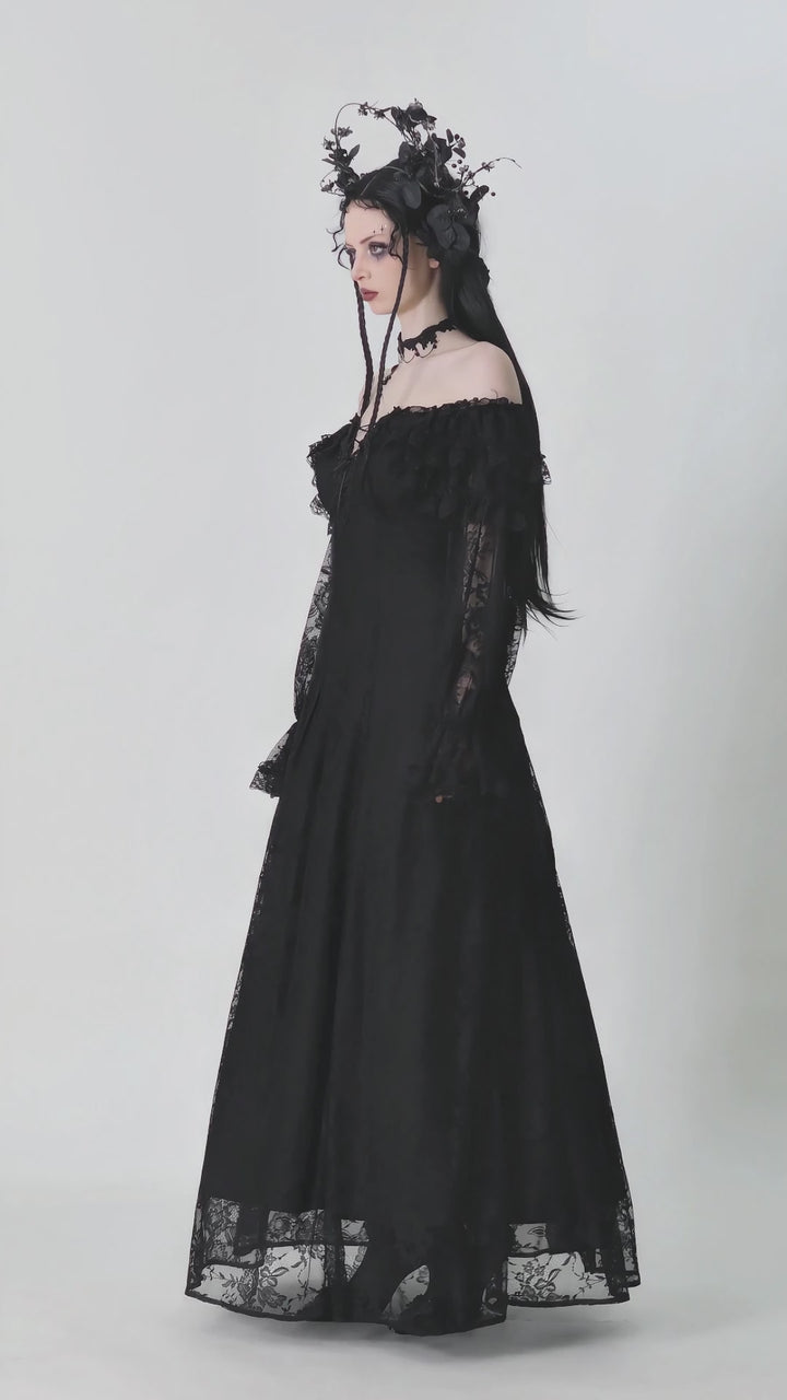 woman wearing off the shoulder long gothic gown 