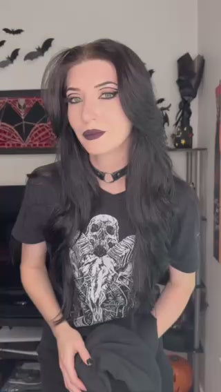 video of goth woman wearing pumpkin hoodie