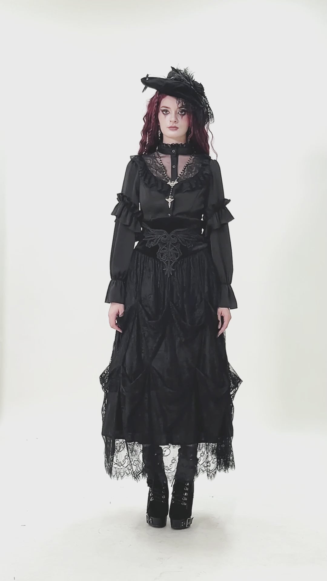 gothic women wearing vampire clothes