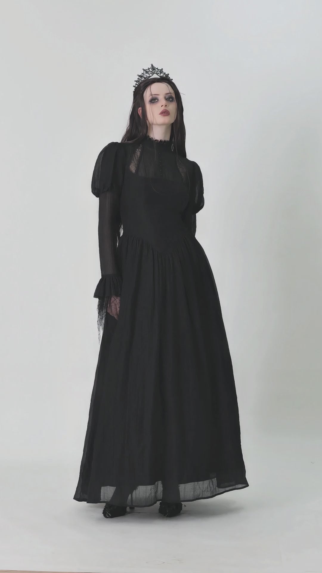 gothic woman wearing a gothic renaissance gown 