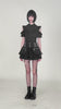 Video of model wearing punk belted mini skirt