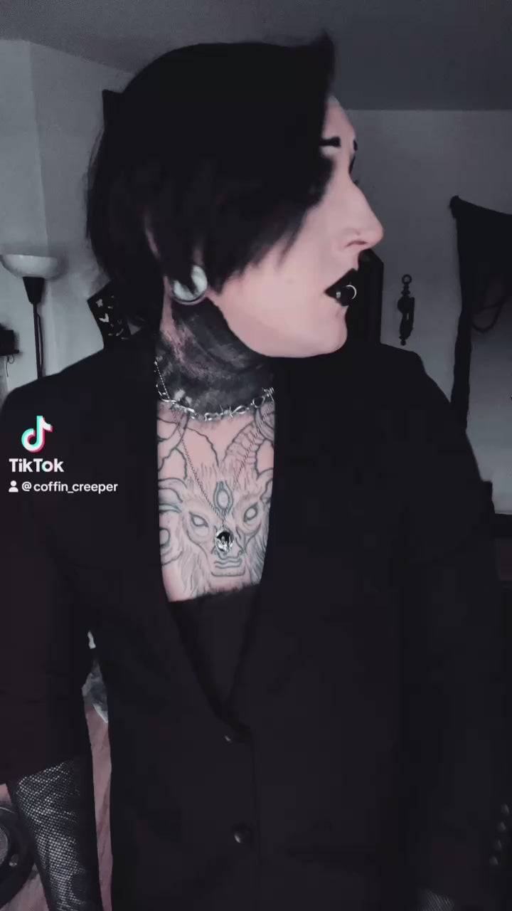 video of gothic guy wearing punk clothes