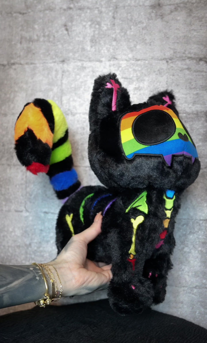 video of a gothic skeleton kitty cat plushie stuffed animal for pride month