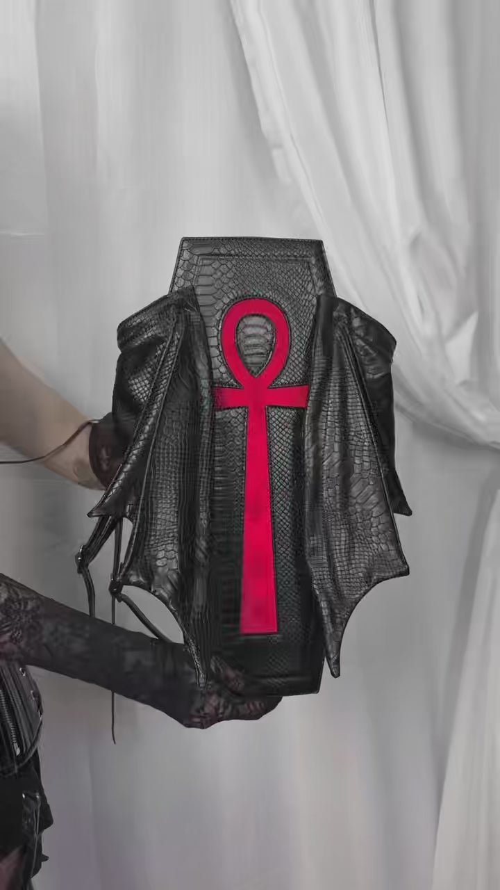 video of a gothic coffin backpack