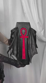 video of a gothic coffin backpack