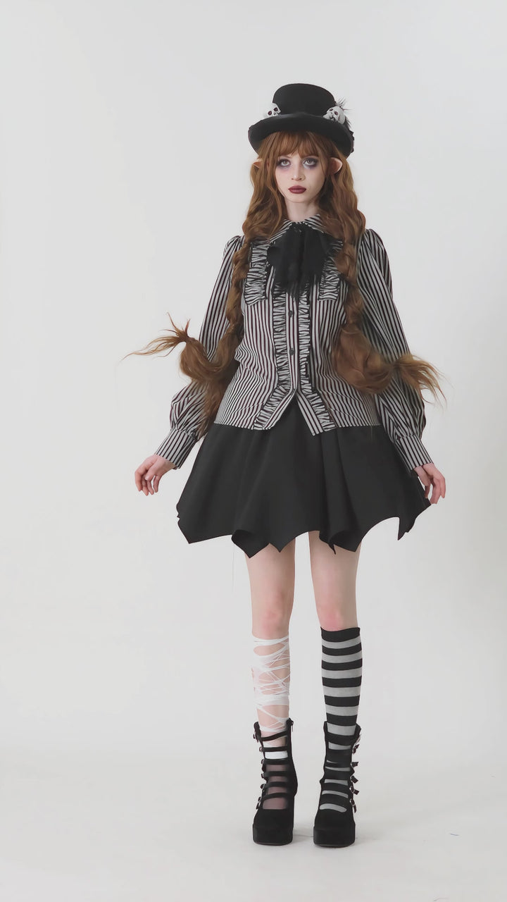 video of gothic woman wearing striped long sleeve buttoned shirt
