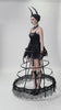 video of gothic girl wearing a maxi length black caged hoop skirt