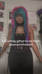 video of emo girl with a cute creepy cat-shaped pillow