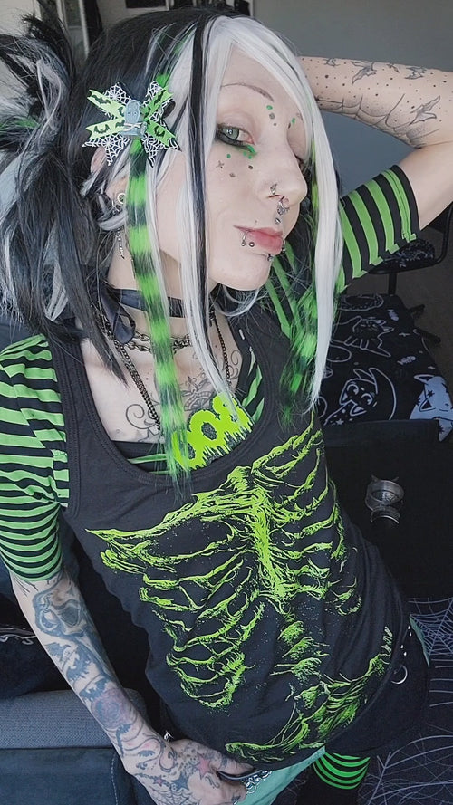 goth girl wearing green cybergoth clothes