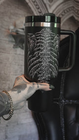 Video of insulated tumbler with bleeding heart skeleton graphic from VampireFreaks