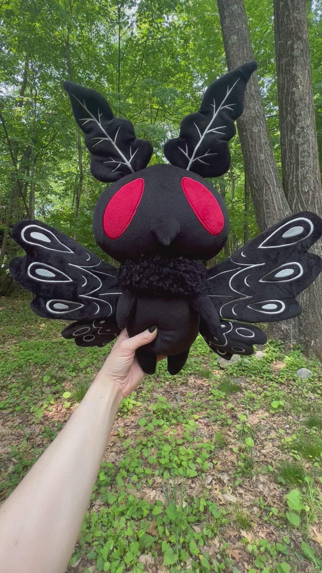 video showing mothman plushie