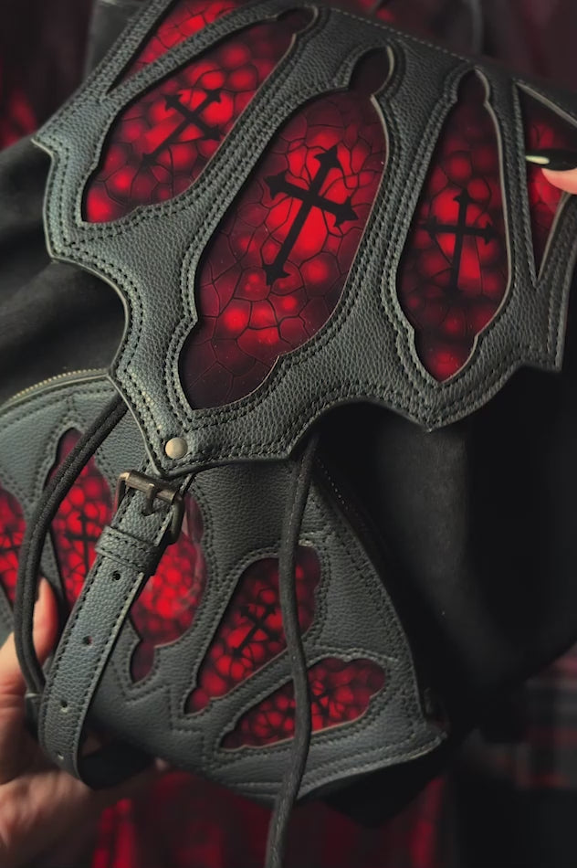 video of a vegan leather gothic cathedral inspired backpack