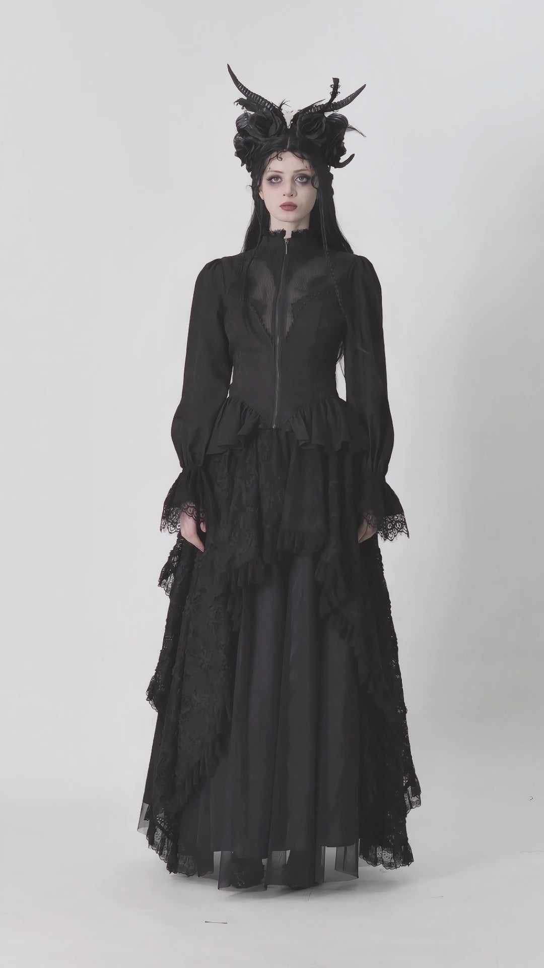 video of a gothic woman wearing a high low hem gothic coat