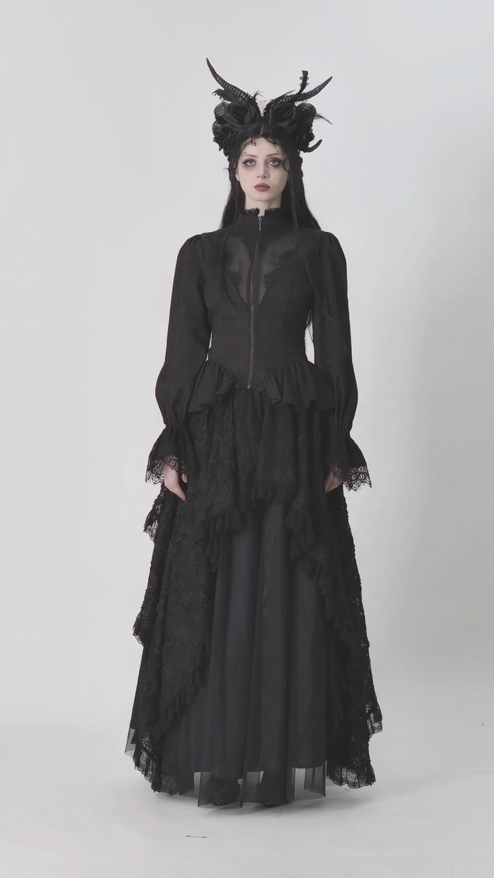 video of a gothic woman wearing a high low hem gothic coat