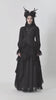 video of a gothic woman wearing a high low hem gothic coat