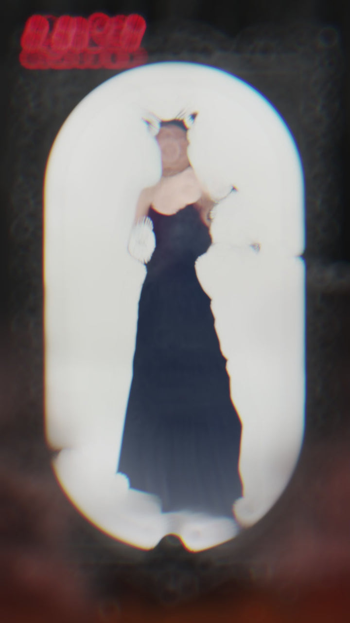 video showing woman wearing maxi velvet gothic skirt