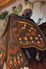 video of a whimsical embroidered moth wings backpack