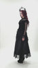 video of a victorian goth woman wearing a ruffled long sleeve top