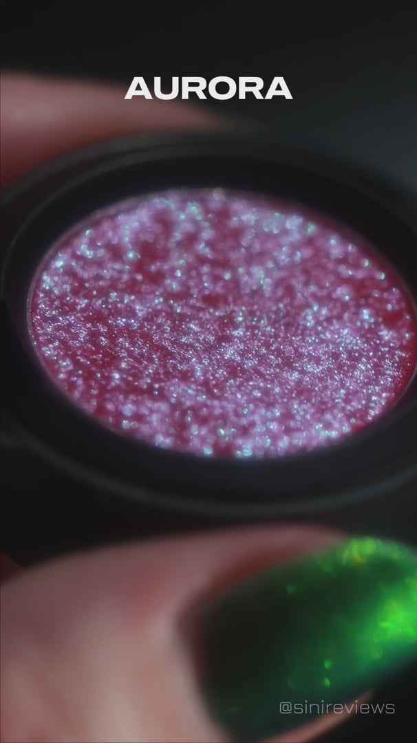 video of bright pink glittery eye shadow  by curst