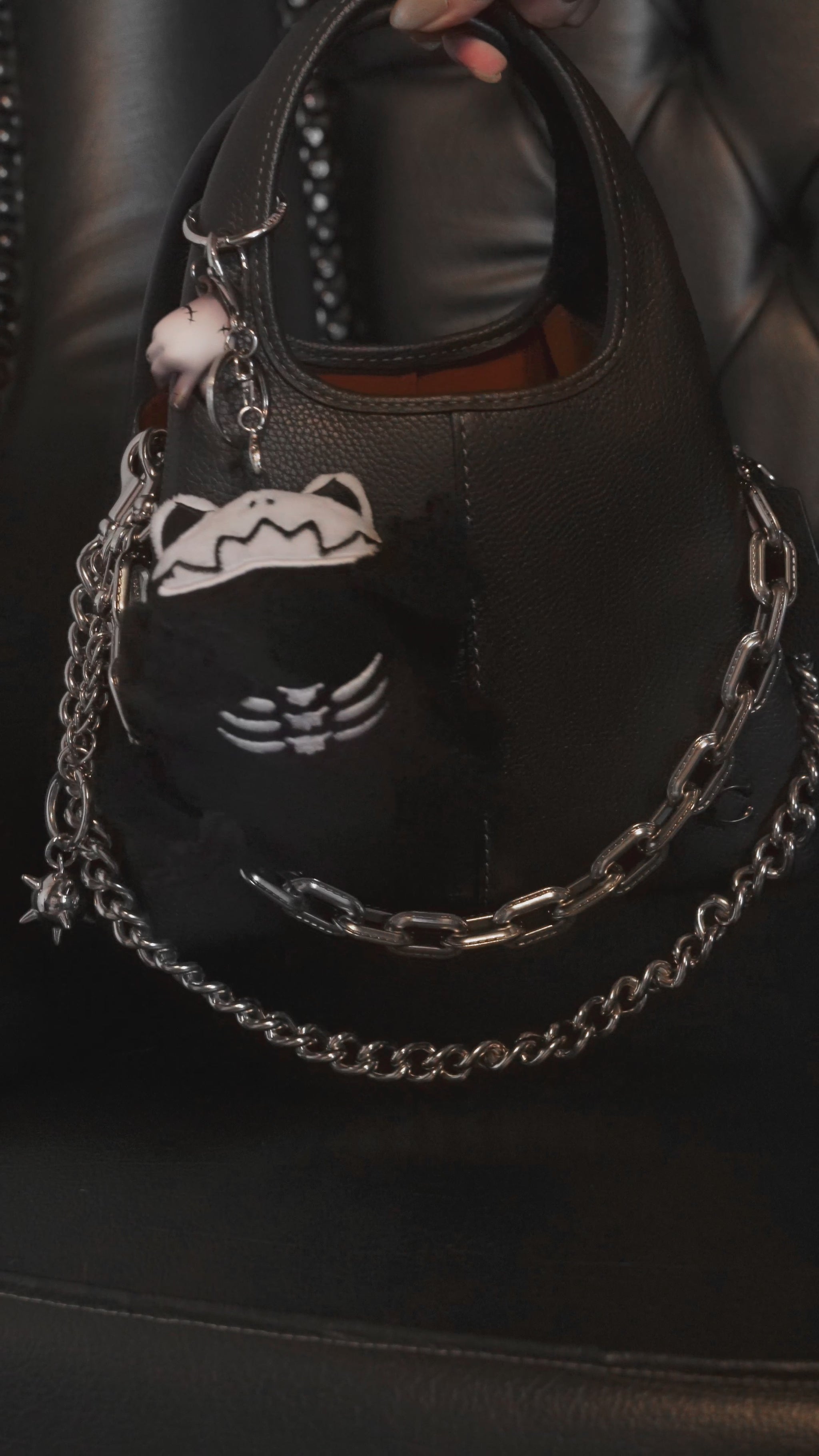video of a small skeleton frog keychain
