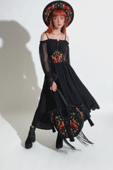 woman wearing a gothic embroidered fox shoulder bag