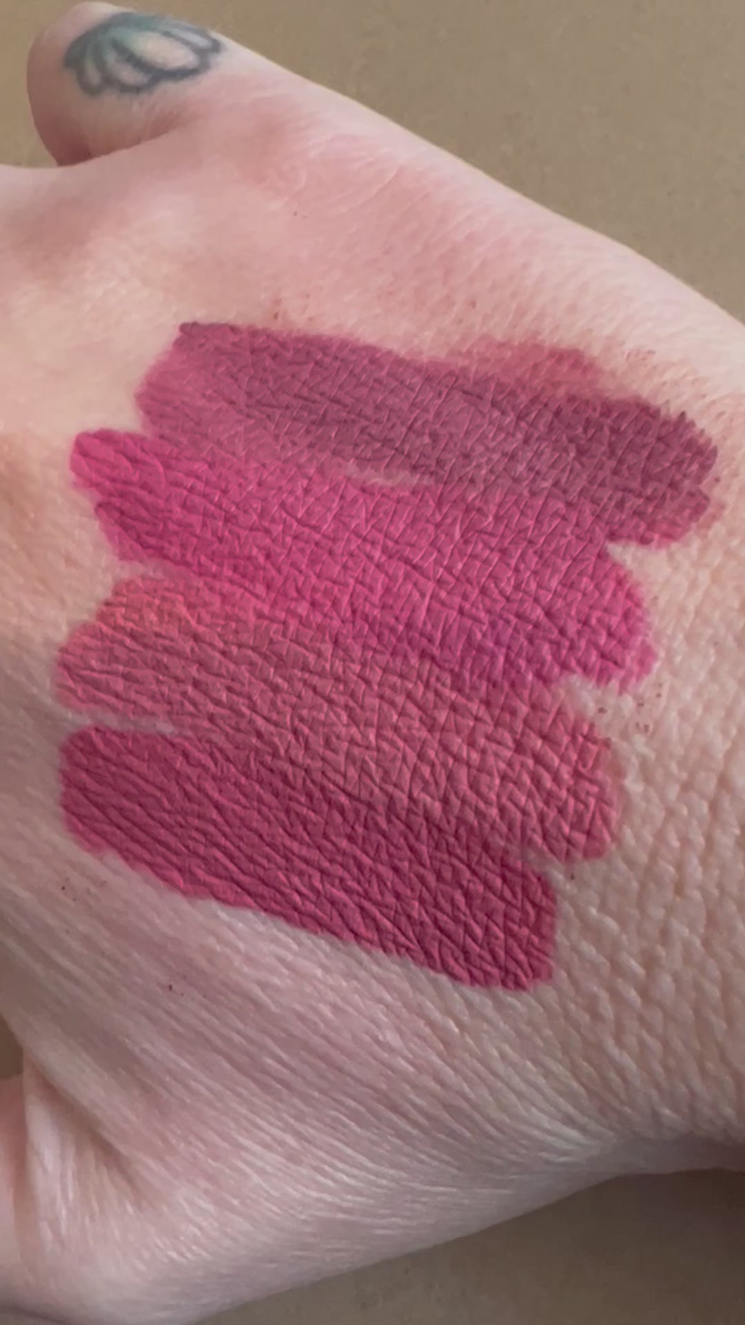 video of dark pink liquid lipsticks