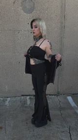 gothic woman wearing a heavy metal hoodie