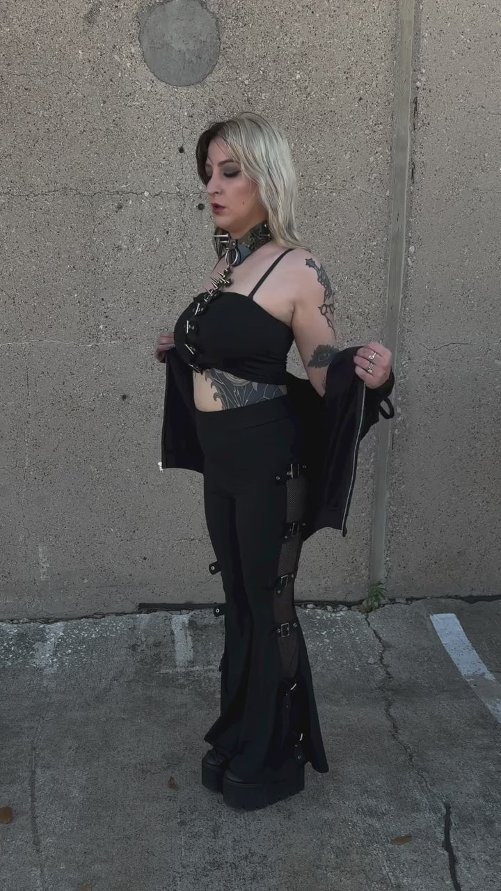 gothic woman wearing a heavy metal hoodie