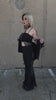 gothic woman wearing a heavy metal hoodie