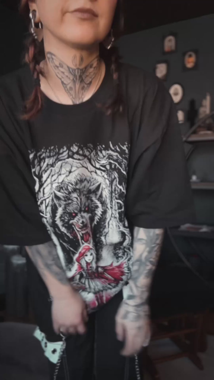 video of punk girl wearing distressed skull cap ad heavy meal wold shirt