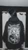 gothic woman wearing a vampire bat hoodie jacket