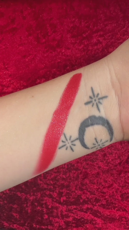video of a glittery rich dark vampire chromatic deep red eye shadow by curst kosmetics