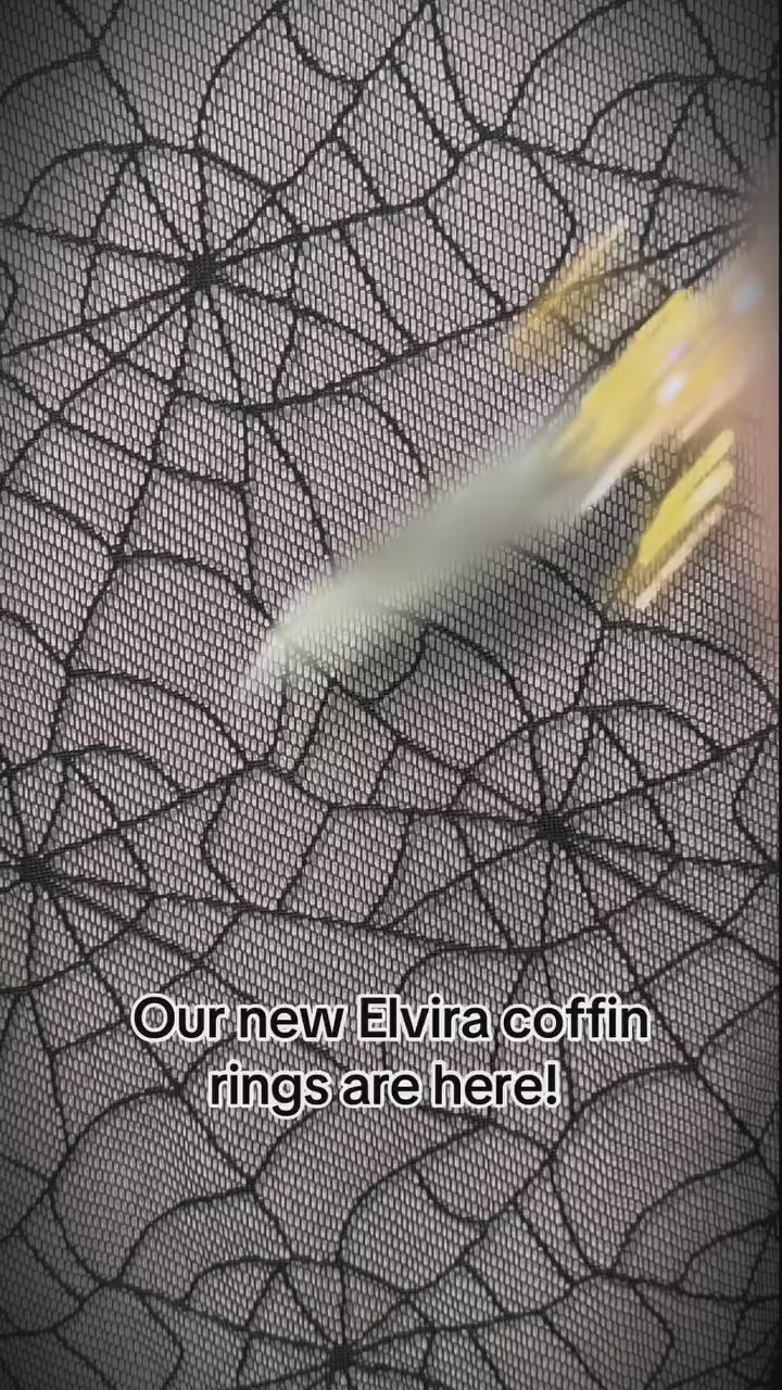 video of rockabilly woman wearing an elvira ring by kreepsville 