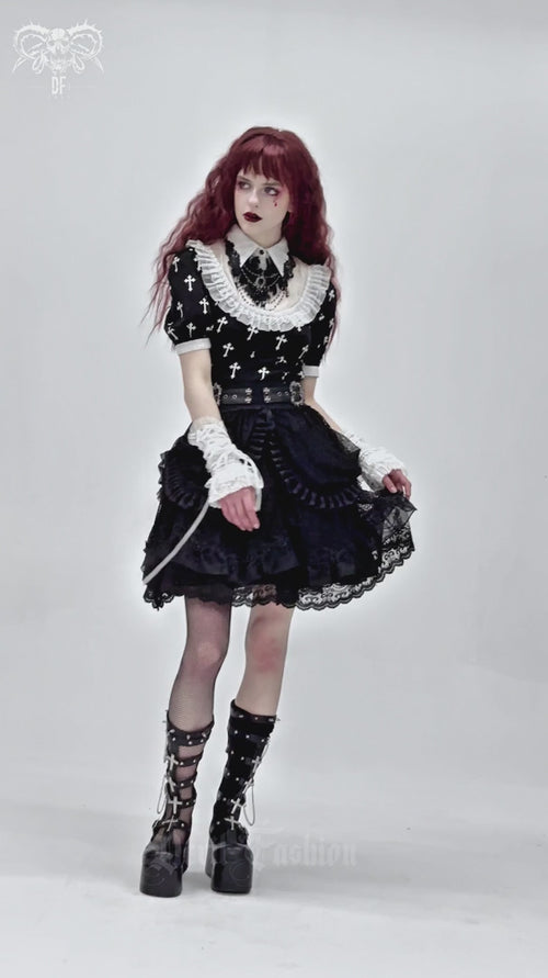 vide of a gothic woman wearing a high waisted gothic ruffle skirt