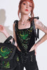 video of a gothic woman wearing a forest goth nature lover corset with embroidered ferns 