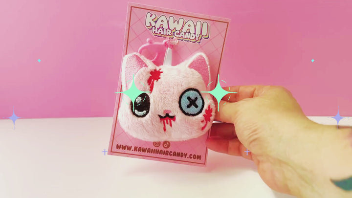 video of creepy cute keychain