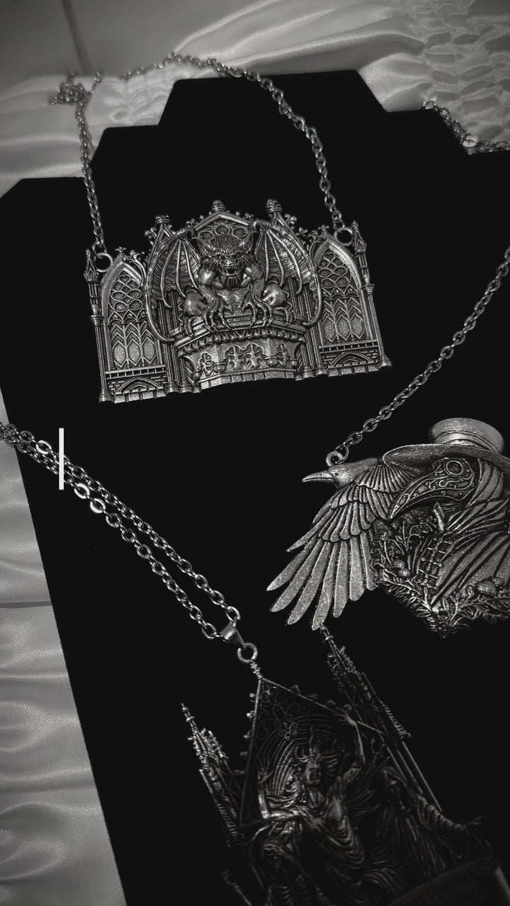 video showing closeups of silver sculpted gothic jewelry made of alloy