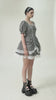 video of a woman wearing a womens striped layered puff sleeve mini dress by dark in love