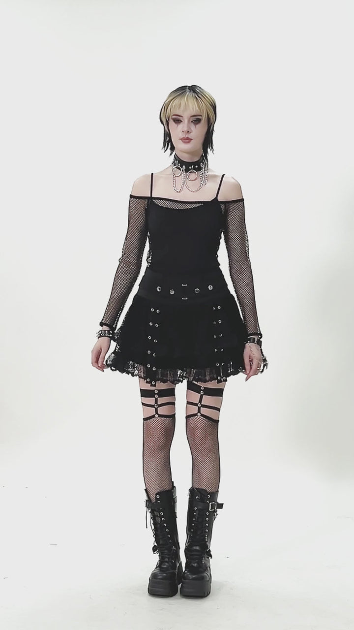 emo woman wearing a off the shoulder fishnet shirt
