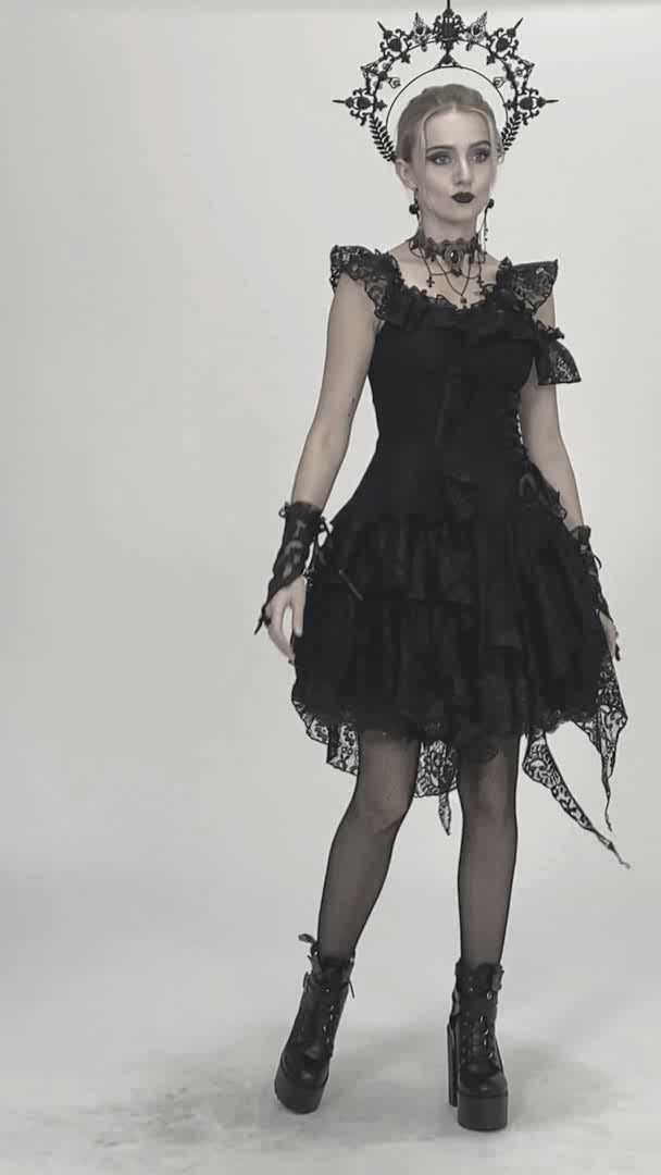 video of a gothic woman wearing a dark lace dress