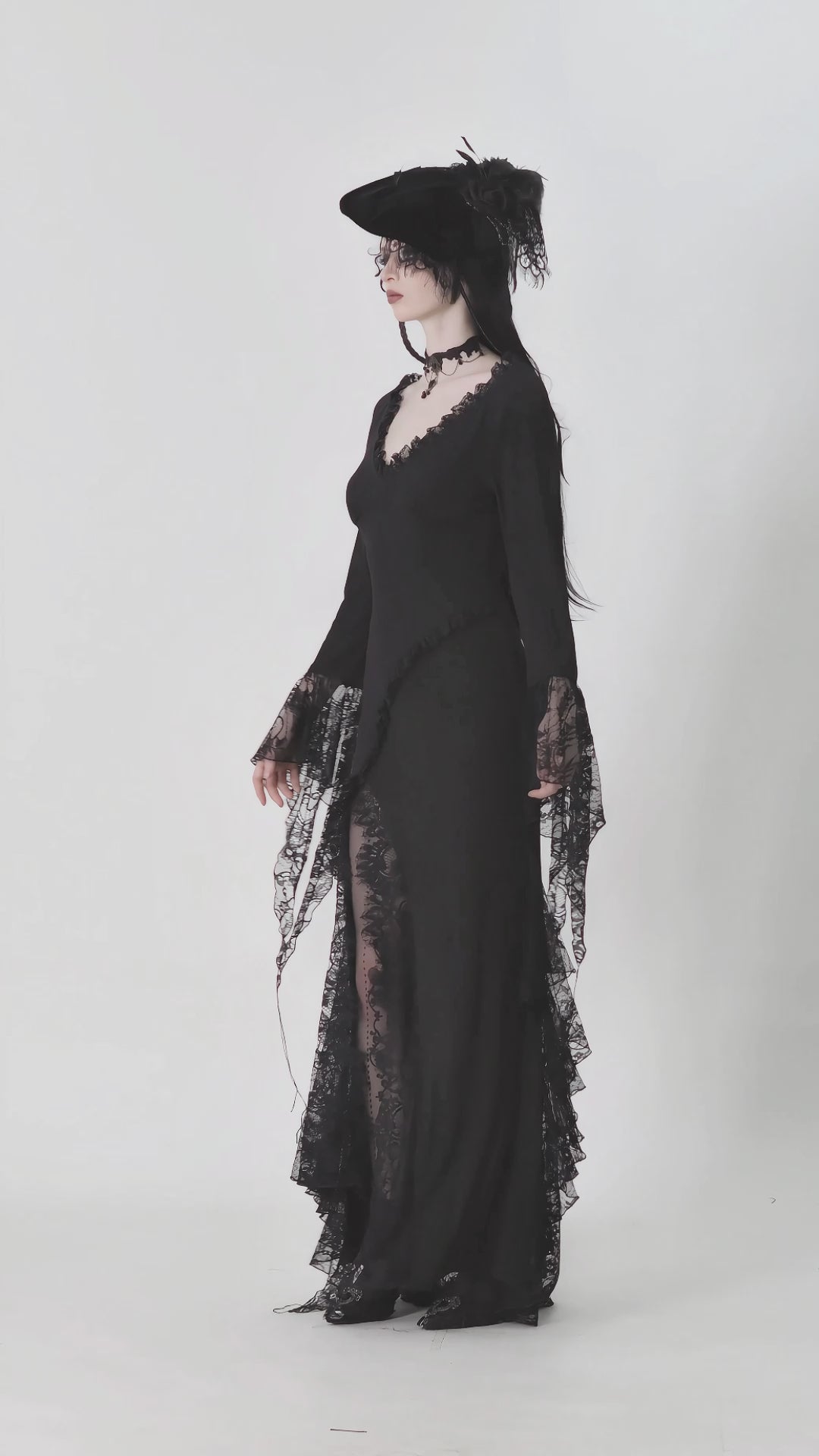 video of gothic woman wearing asymmetric lace dress
