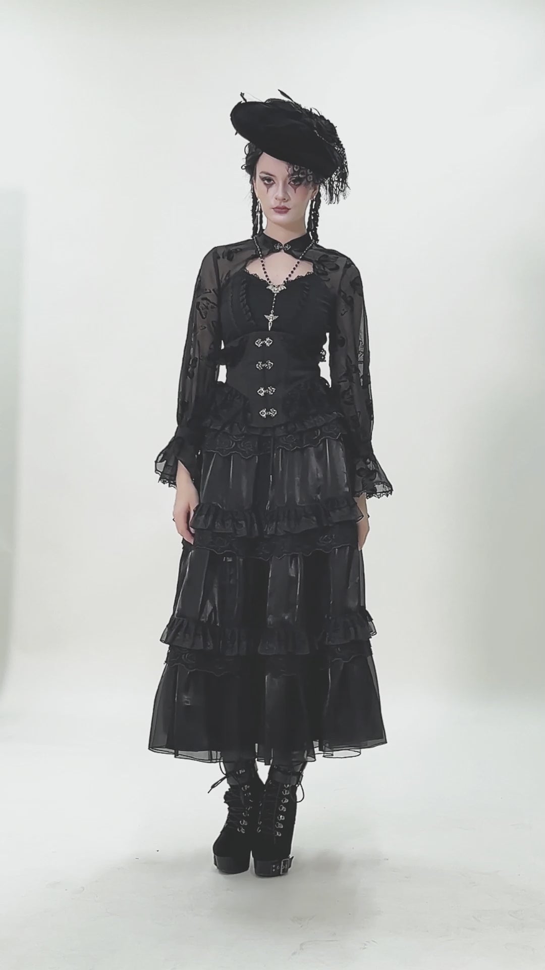 video of gothic woman wearing a long maxi length victorian goth skirt