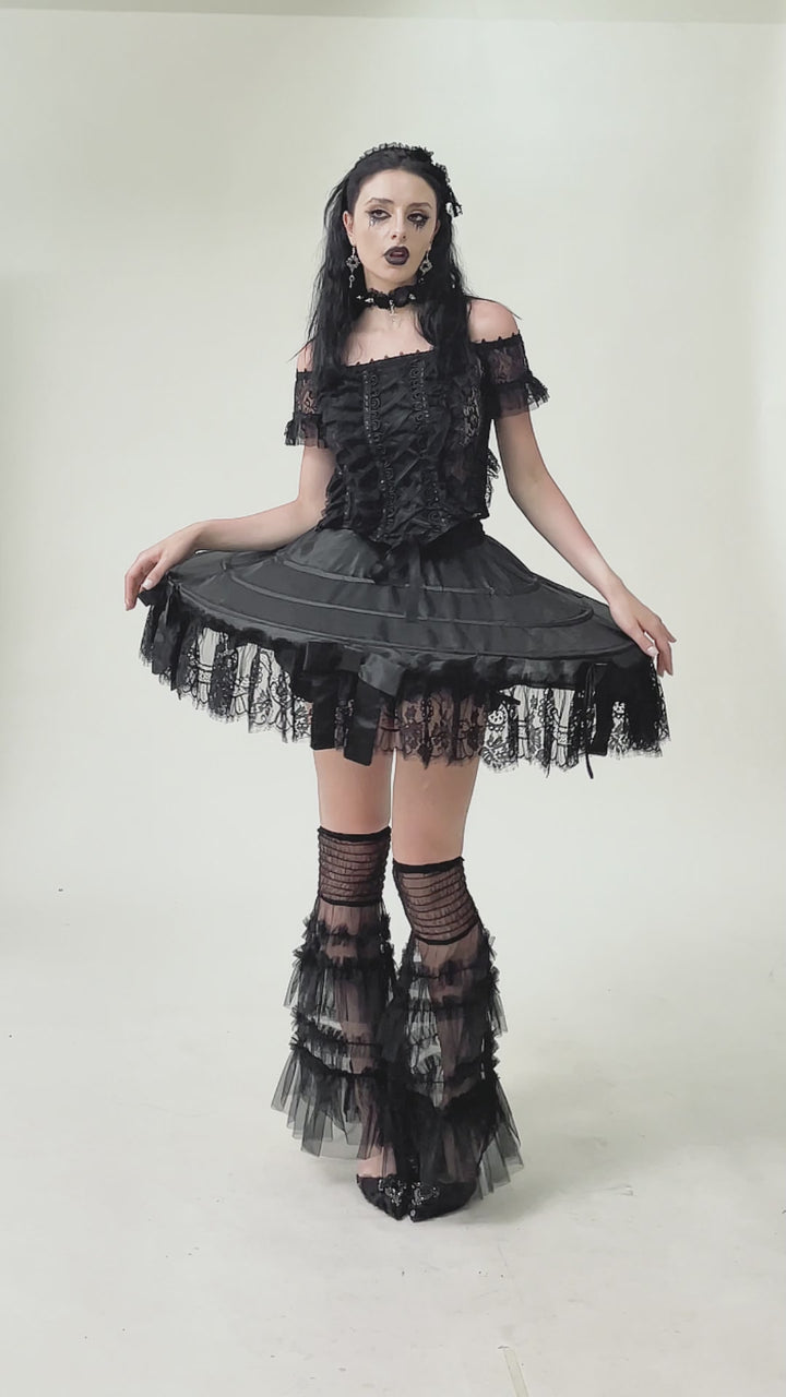 goth woman wearing a short unique quirky weird girl skirt 