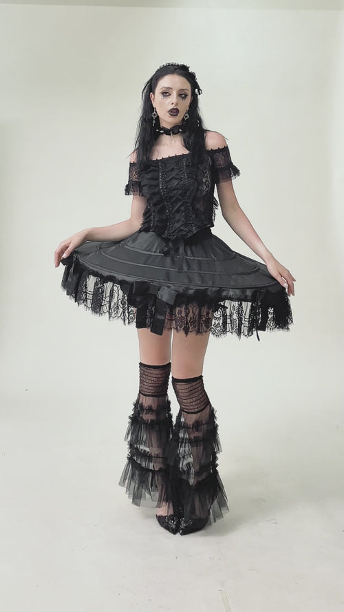 goth woman wearing a short unique quirky weird girl skirt 